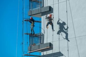Working at Height Training UK construction workers using fall protection equipment