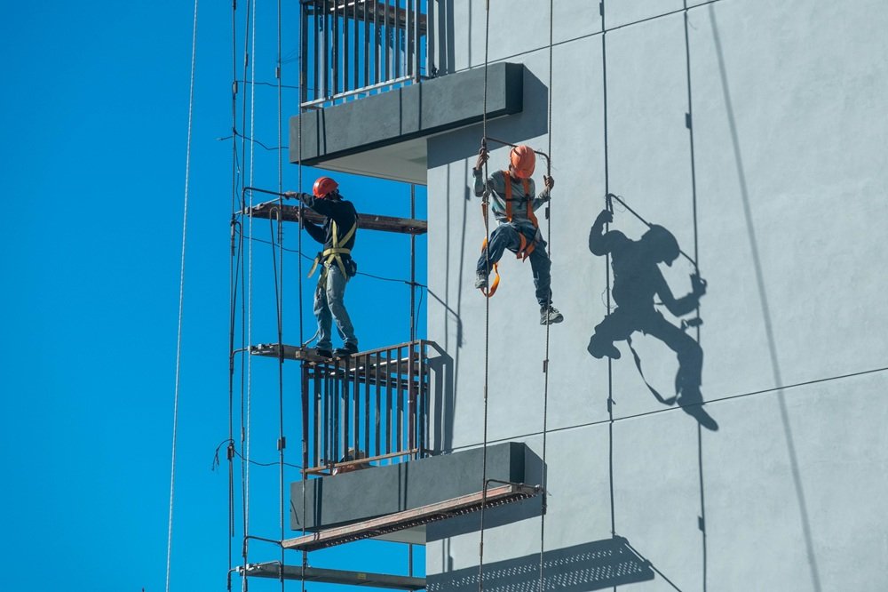 Working at Height Training UK construction workers using fall protection equipment